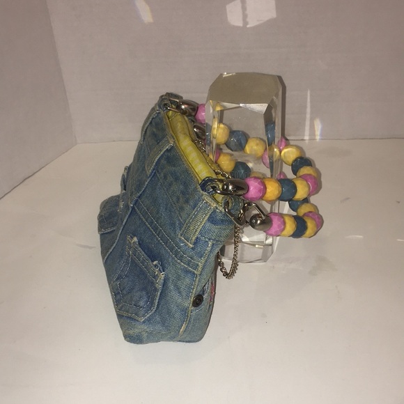 Preowned denim purse with beaded handles and peace patches. - Picture 3 of 7